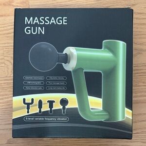 Escape from Alcatraz Massage Gun with Multiple Heads